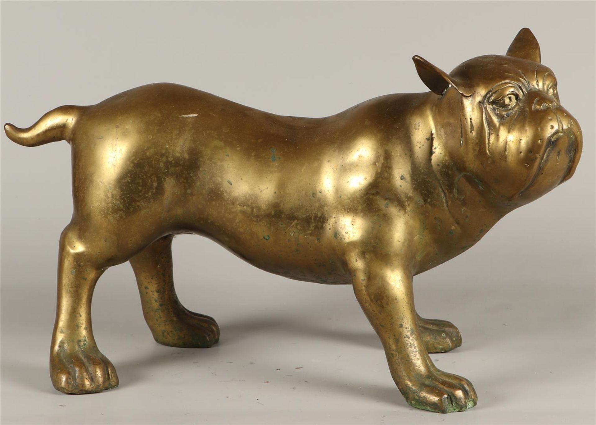 A brass statue of a dog. 2nd half of the 20th century.