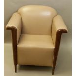 A mahogany and faux leather club armchair in Art Deco style. 20th century.