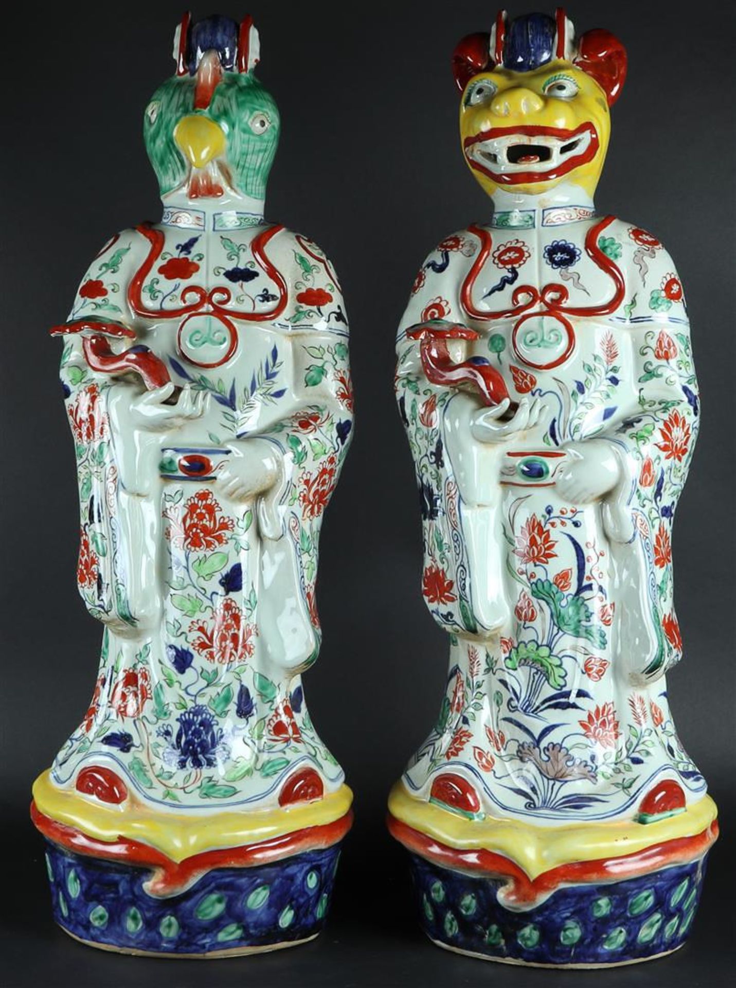 A set of two porcelain wucai zodiac figures. China, late 20th century.