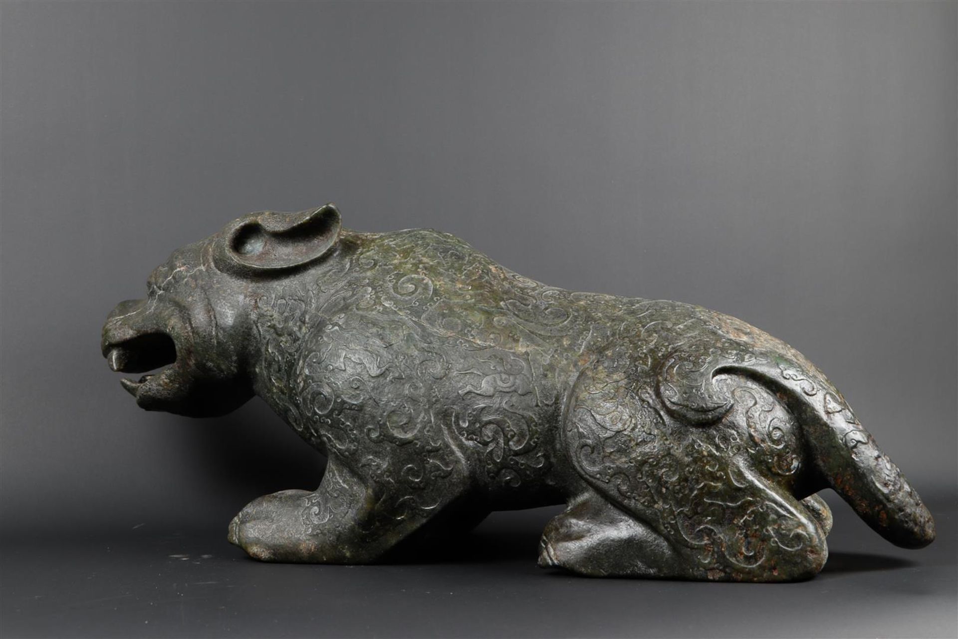 A "Spinach" jade sculpture of a fantasy lion. 20th century. Weight 34.5 kg. - Image 6 of 14