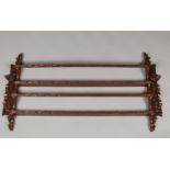 A richly carved two-shelf plate rack, 19th century.