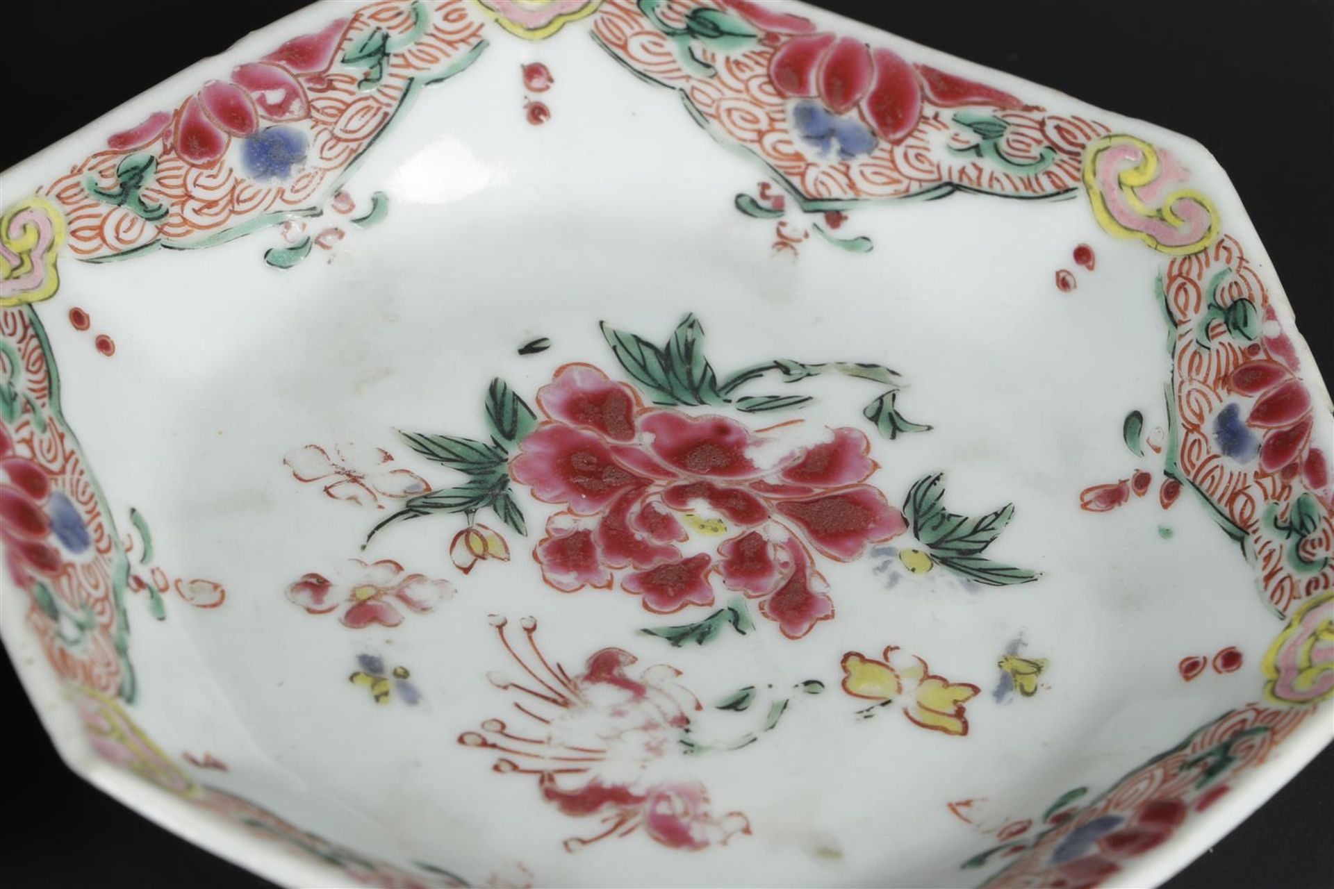 Three porcelain angled Famille Rose plates with rich floral decoration. China, Yongzheng/Qianlong. - Image 6 of 6