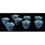 A set of eight porcelain cups with floral decoration, marked Kangxi. China, 19th century.