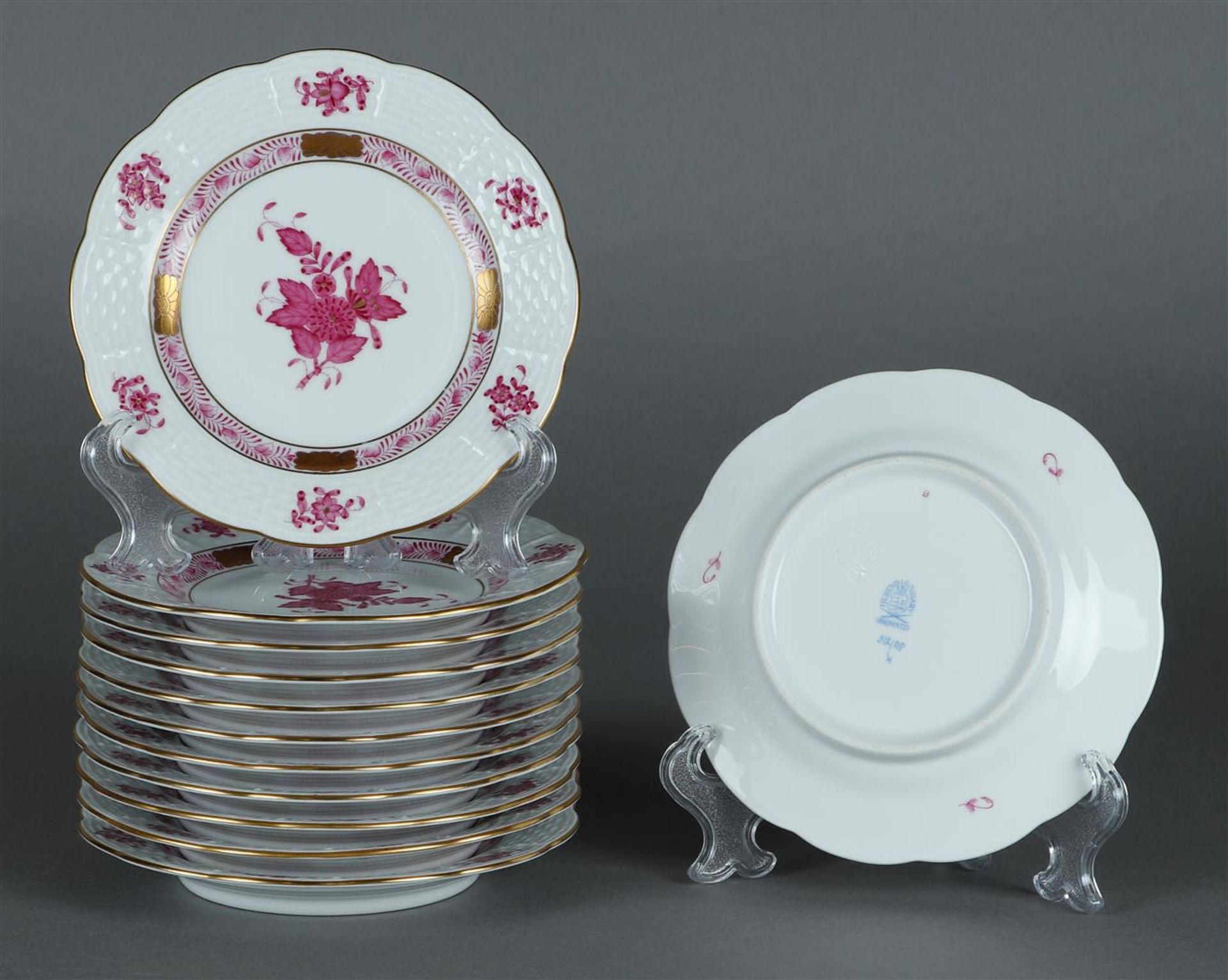 A set of 12 porcelain pie plates with apponyi purple decor. Herend, Hungary.