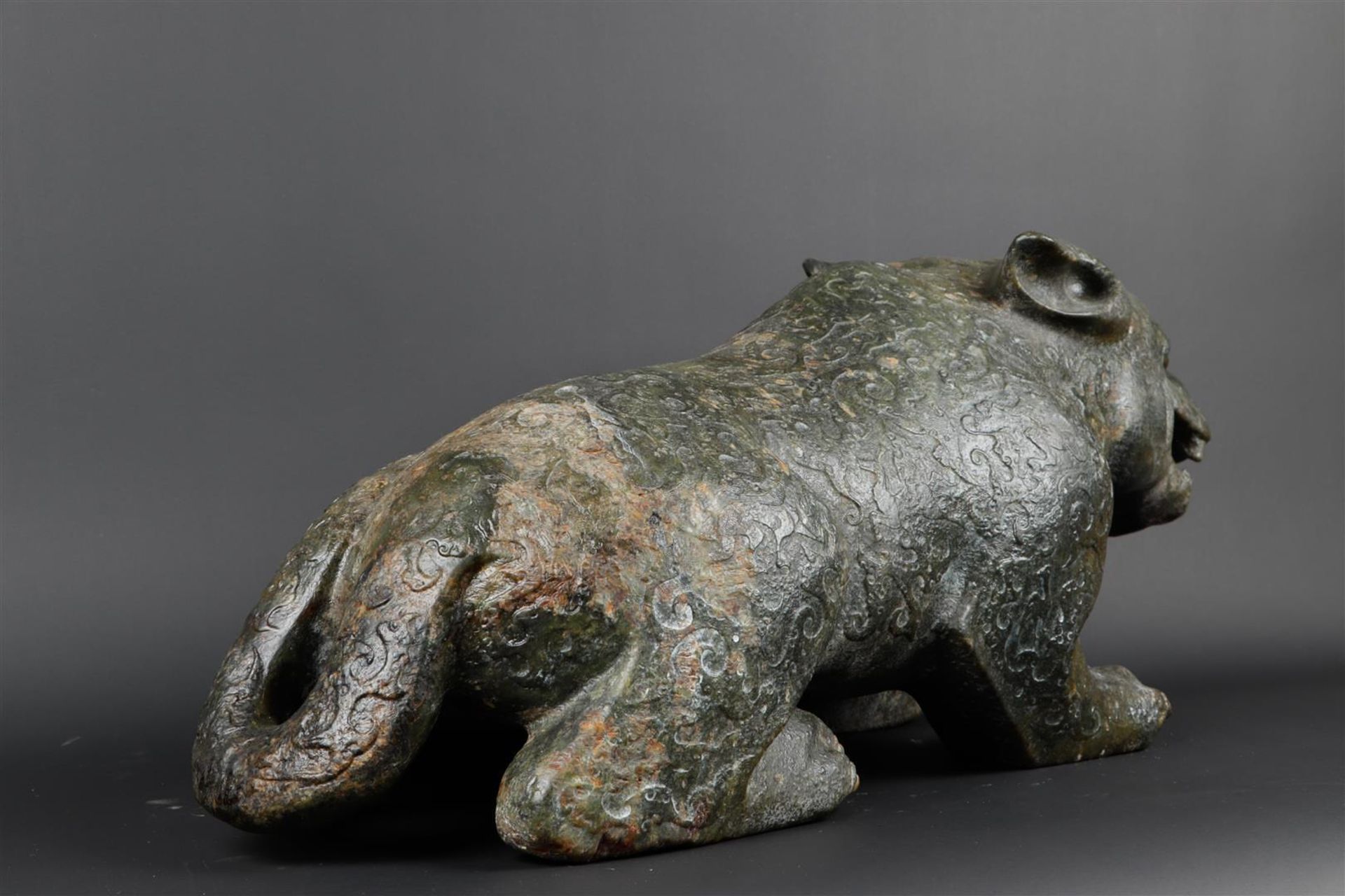 A "Spinach" jade sculpture of a fantasy lion. 20th century. Weight 34.5 kg. - Image 7 of 14