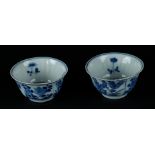 Two porcelain bowls with ribbed relief with floral decoration in 4 squares, a flower basket decor in