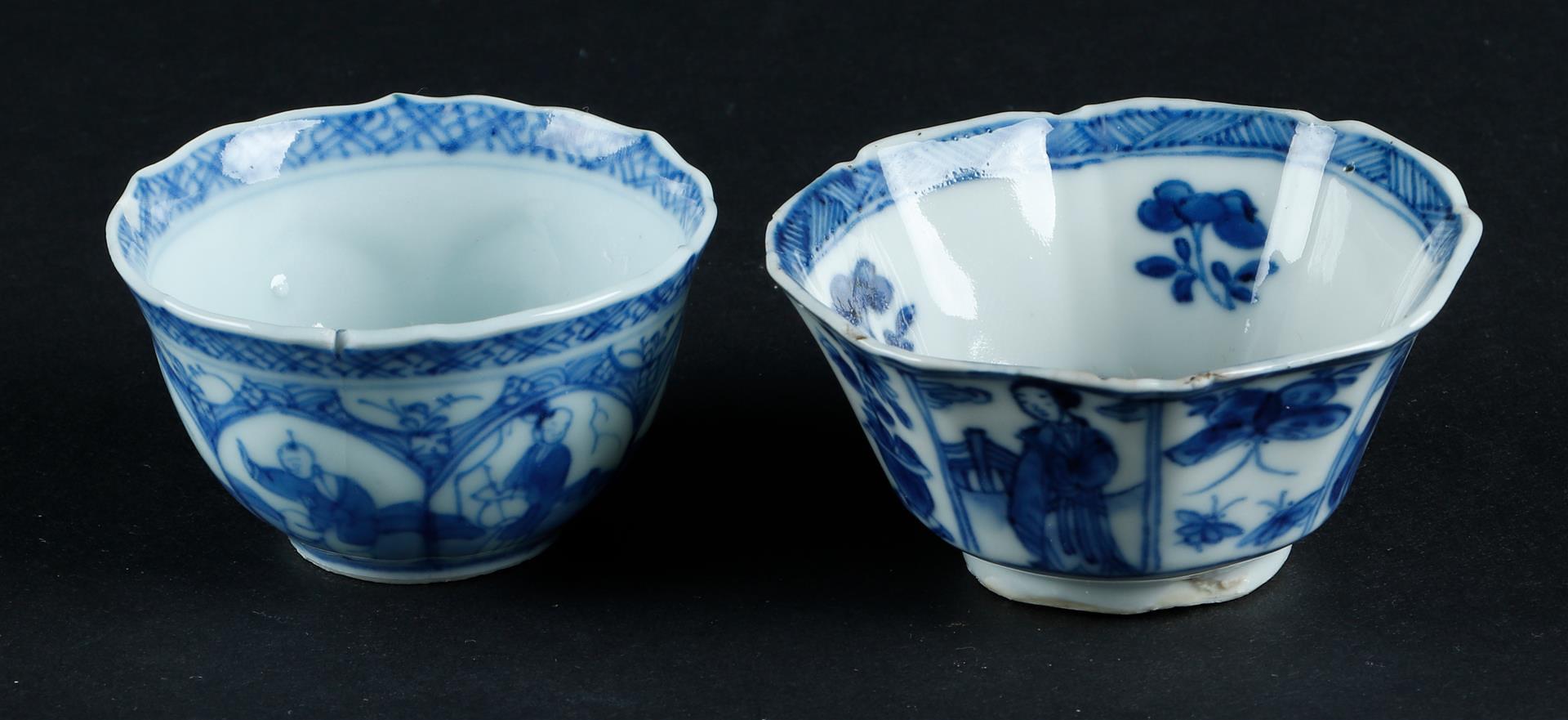 Two porcelain various bowls with decoration on the outside of long lines and fools, 1x marked with s