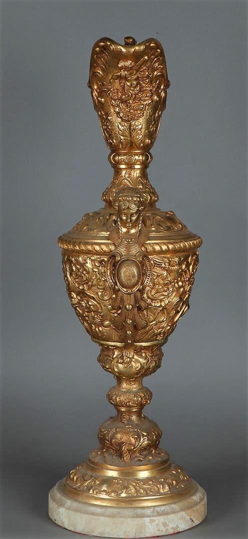 A large richly decorated bronze wine jug on a marble base. France, 19th century. - Image 2 of 3