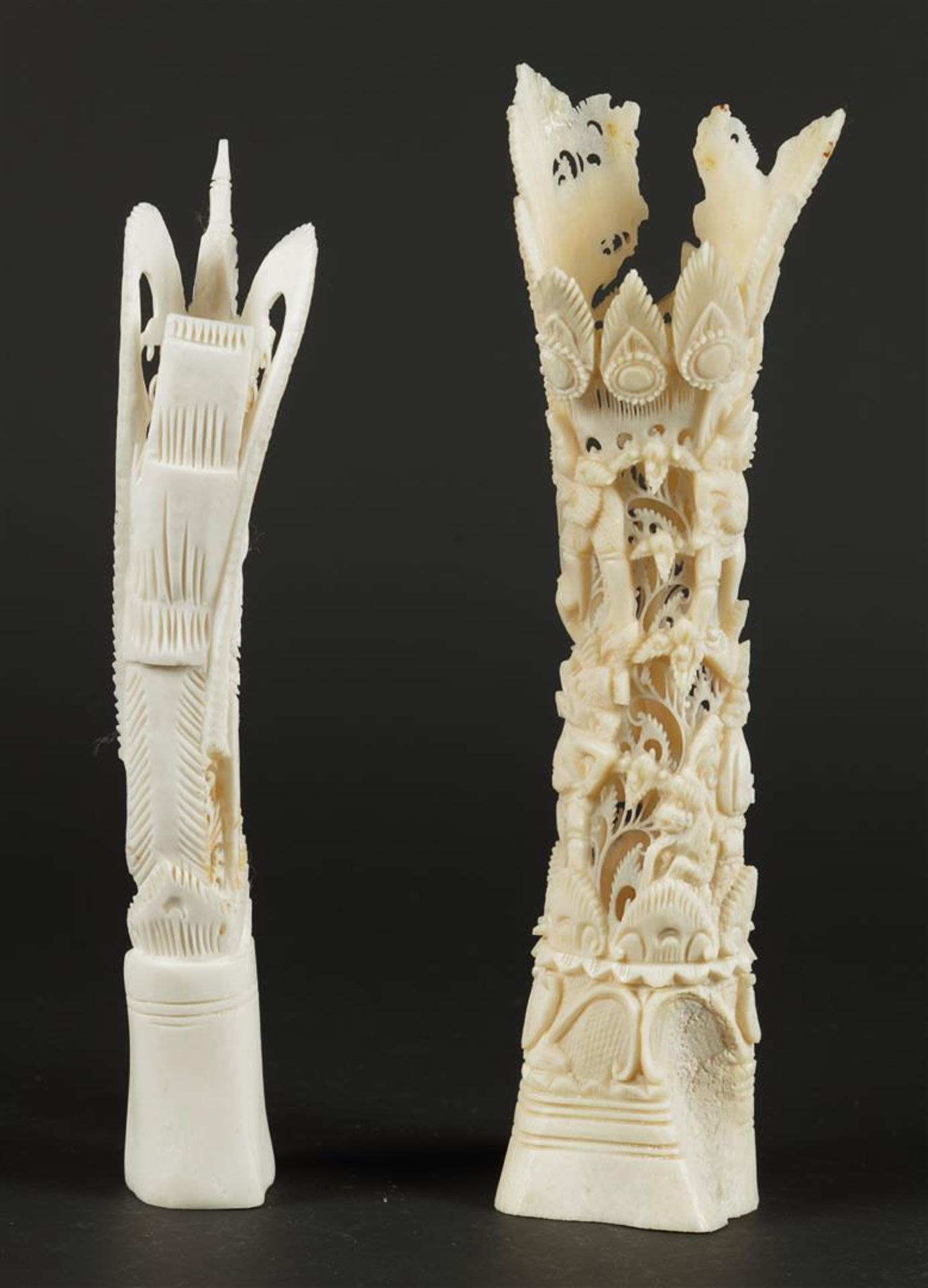 Two bone carvings, one with a Buddha, the other with various figures. India early 20th century H.24 