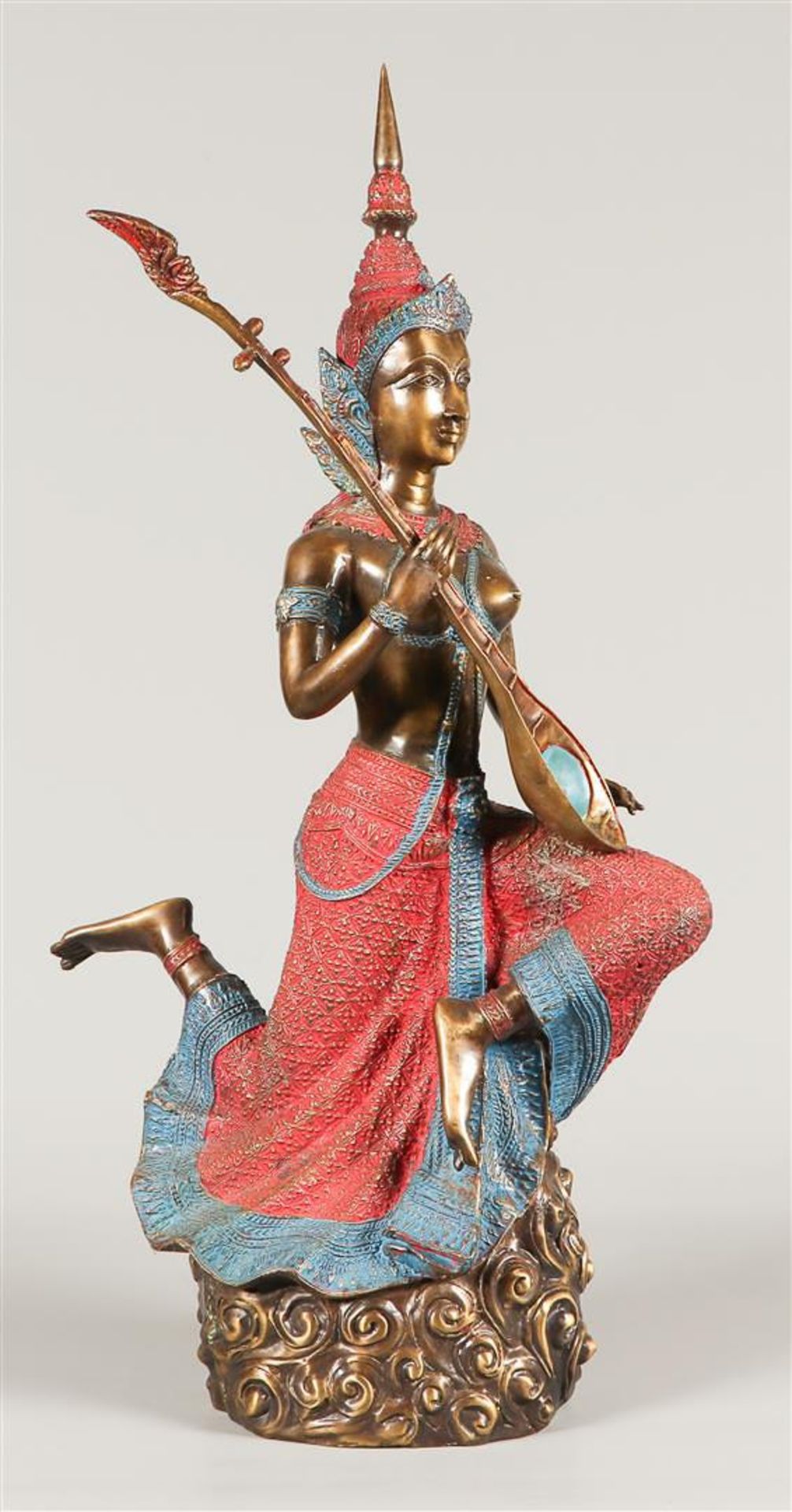 A cold-painted lady playing music. 2nd half of the 20th century.