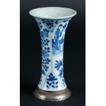 A porcelain beaker vase with lotus beds decor with long echelons decoration. China, Kangxi.