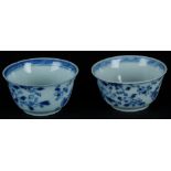 Two porcelain bowls with rich floral decoration. China, Kangxi.