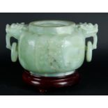 A green jade lidded jar. China, 20th century.