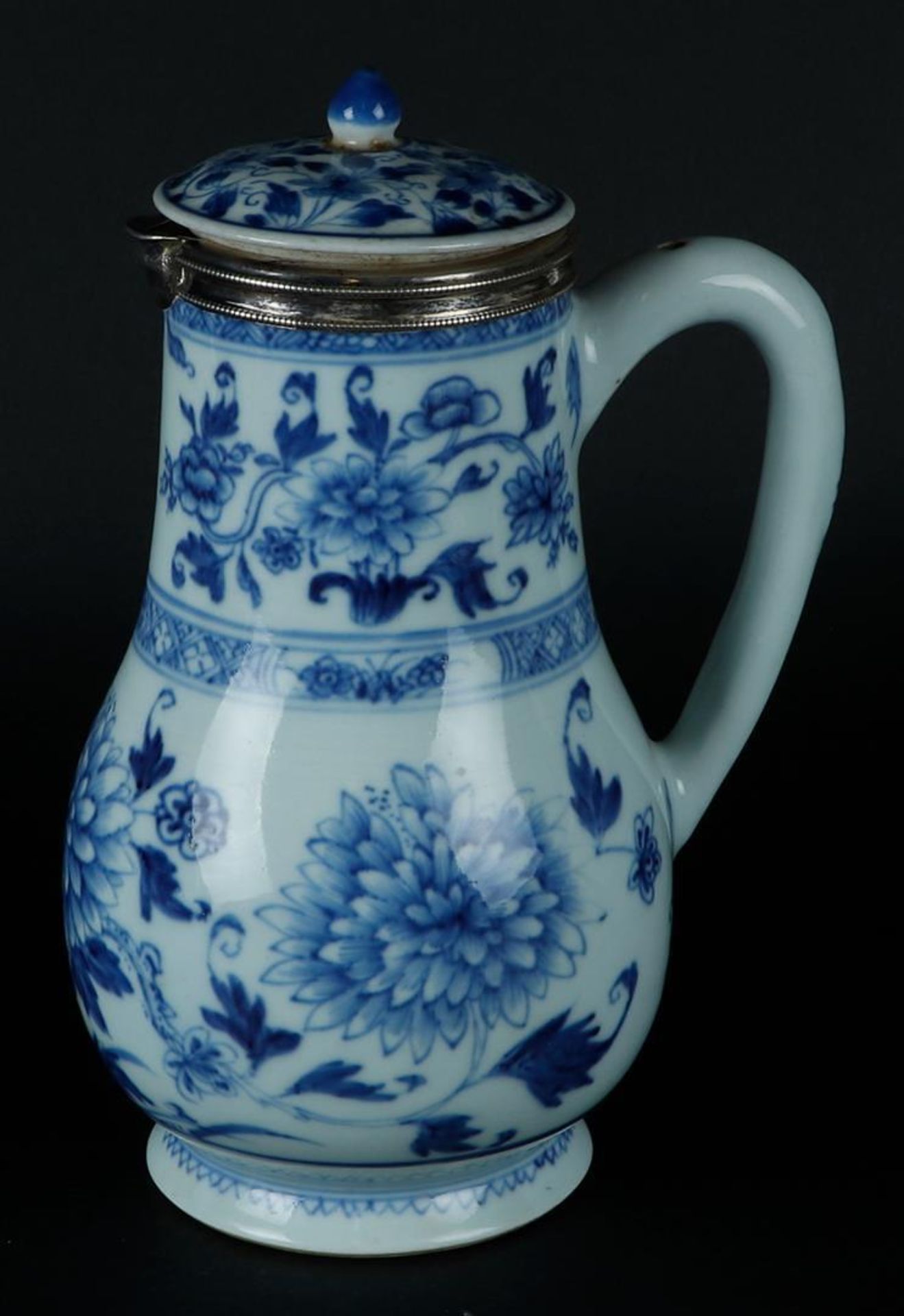 A large porcelain jug with peony decoration, around which rich floral decoration. With silver neck r - Image 3 of 6