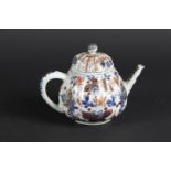 A porcelain Imari teapot with butterfly decoration. China, Qianlong.