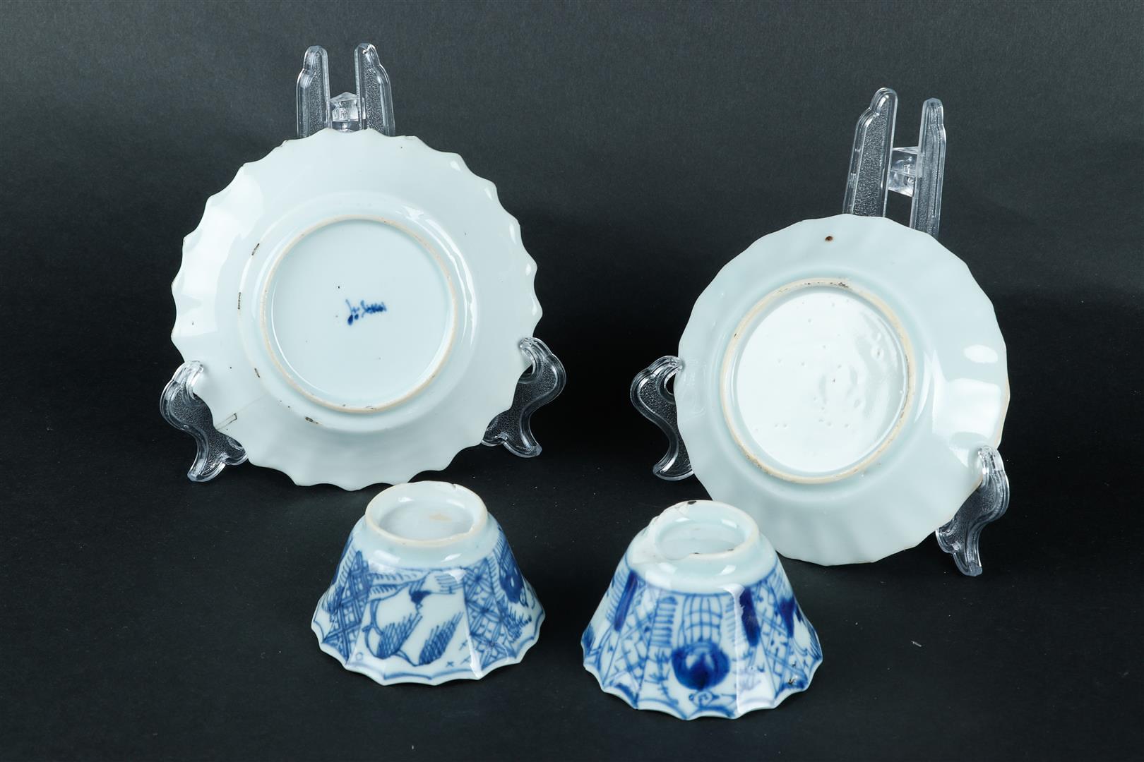 A lot of porcelain angled cups and saucers with a figure and river landscape decor. China, Kangxi. - Image 2 of 2