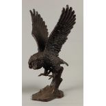 A bronze sculpture of an attacking little owl. Second half of the 20th century.