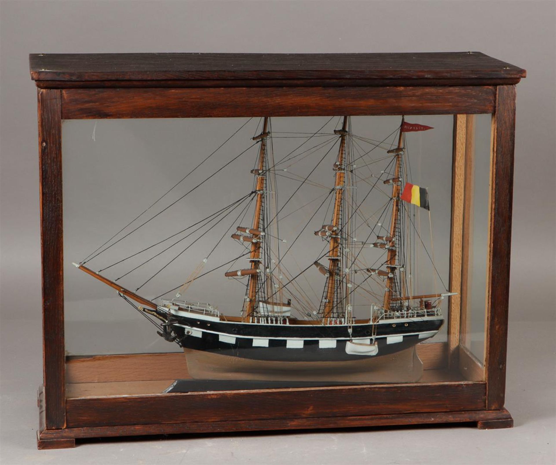 A ship model of a 19th century frigate, in display case. 20th century.