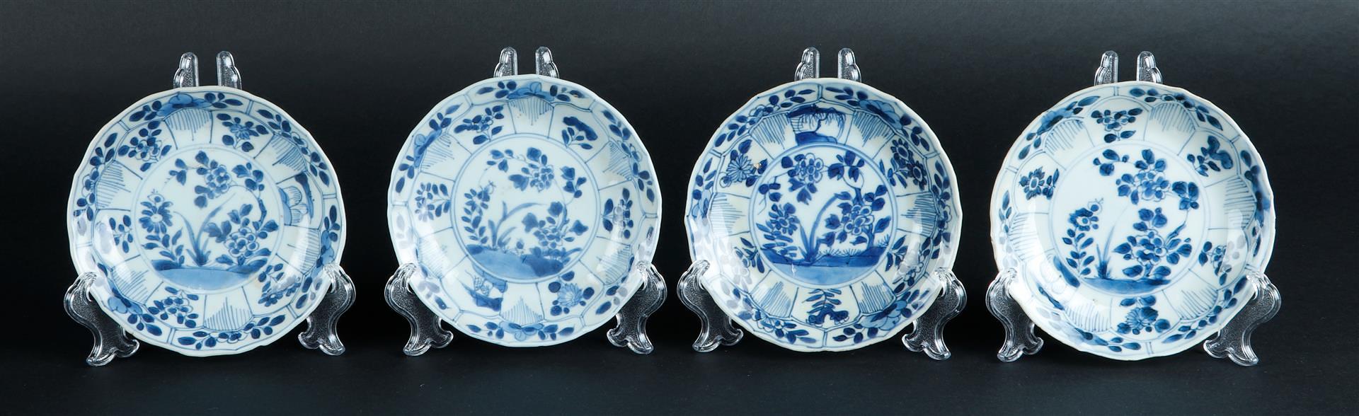 Four porcelain plates with lotus leaf, outer edge, decorated with floral decor. China, Yongzheng.