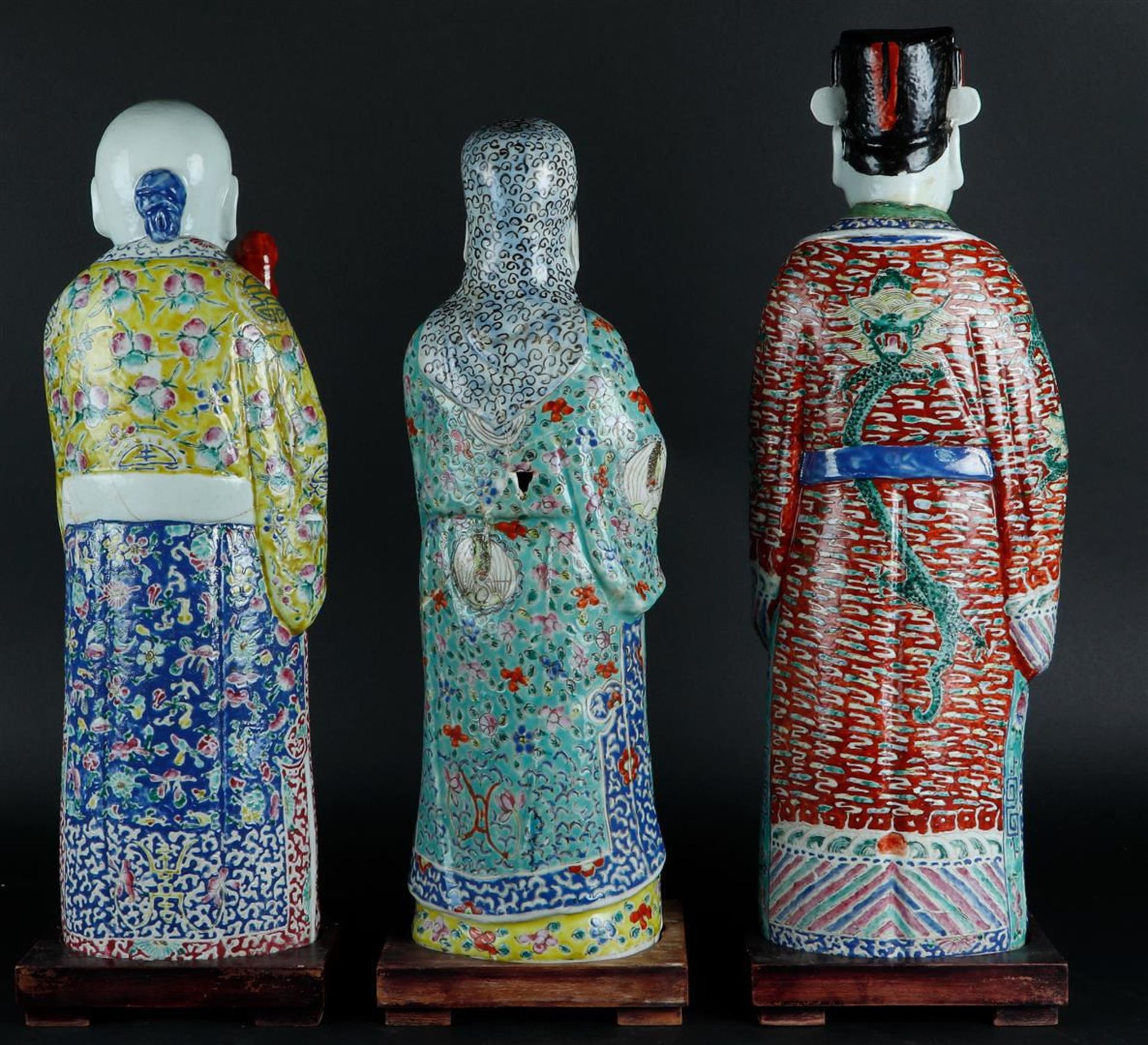 A lot of three porcelain Famille Rose immortals. China, late 19th century. - Image 2 of 3