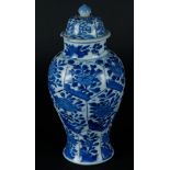 A porcelain lidded vase with flowerbed decoration, in which floral decoration. Marked with lingzhi o