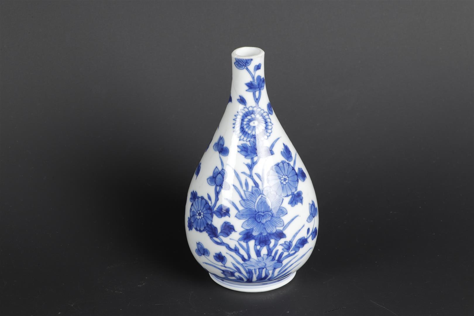 A porcelain belly vase with rich flower-on-rock decor on the front and back. China, Kangxi. - Image 3 of 5