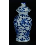 A porcelain lidded vase with a decor of birds and blossom. China, 19th century.