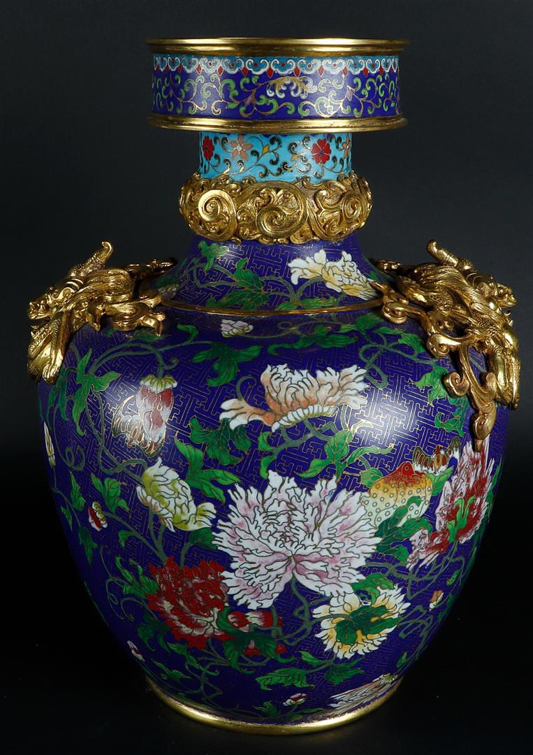 A large cloisonné vase decorated with flowers and on the side with gilded dragons, marked Qianglong.