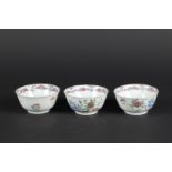 Three Famille Rose porcelain bowls with rich floral decoration. China, Yongzheng.