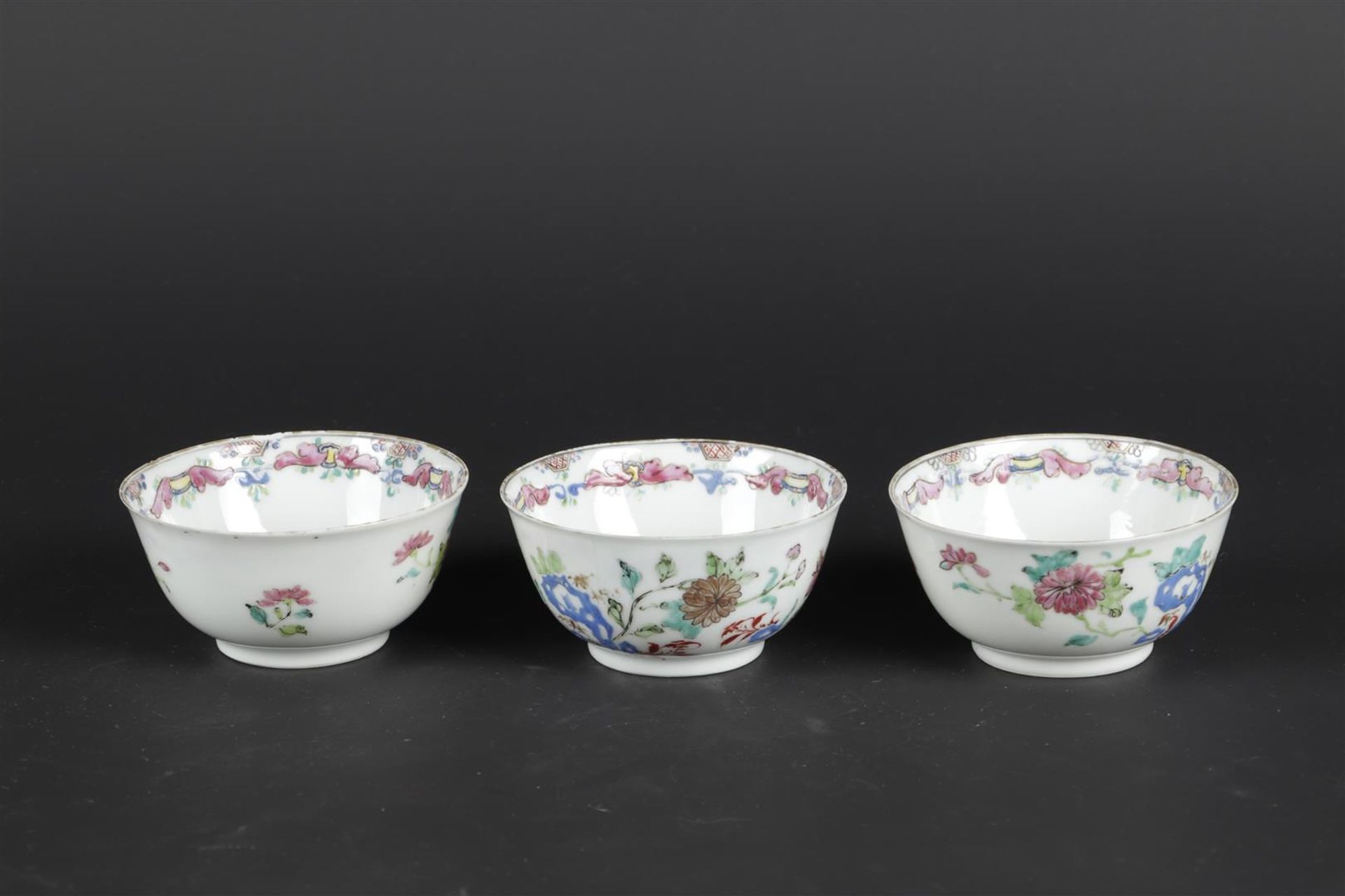 Three Famille Rose porcelain bowls with rich floral decoration. China, Yongzheng.