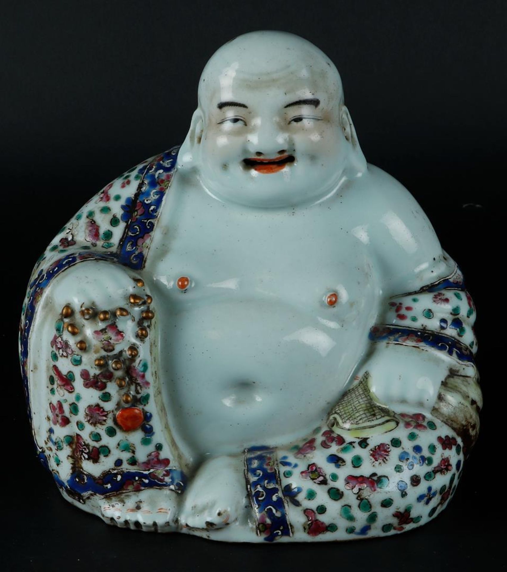 A porcelain Famille Rose Buddha. China, Republic.