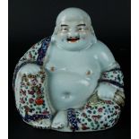 A porcelain Famille Rose Buddha. China, Republic.