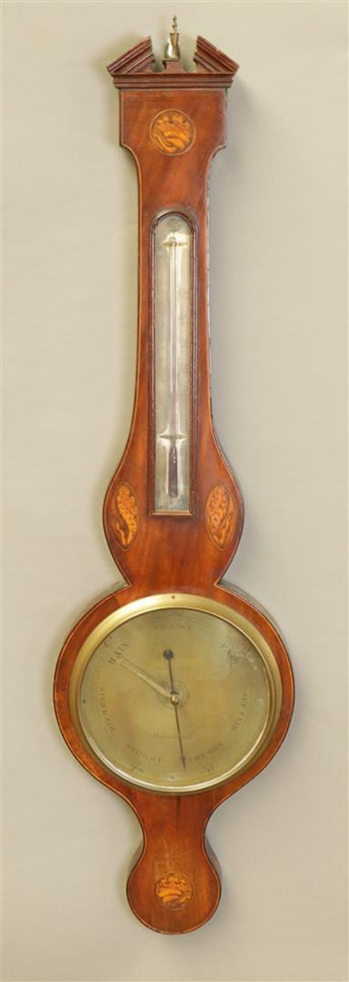 An English banjo barometer with intarsia. 19th century.