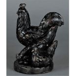 A dark patinated bronze group of chickens. 20th century.