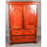 A Dutch oak cabinet with two drawers and a double door. Approx. 1830.