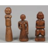 A lot consisting of (3) wooden figurines, India, including 19th century.