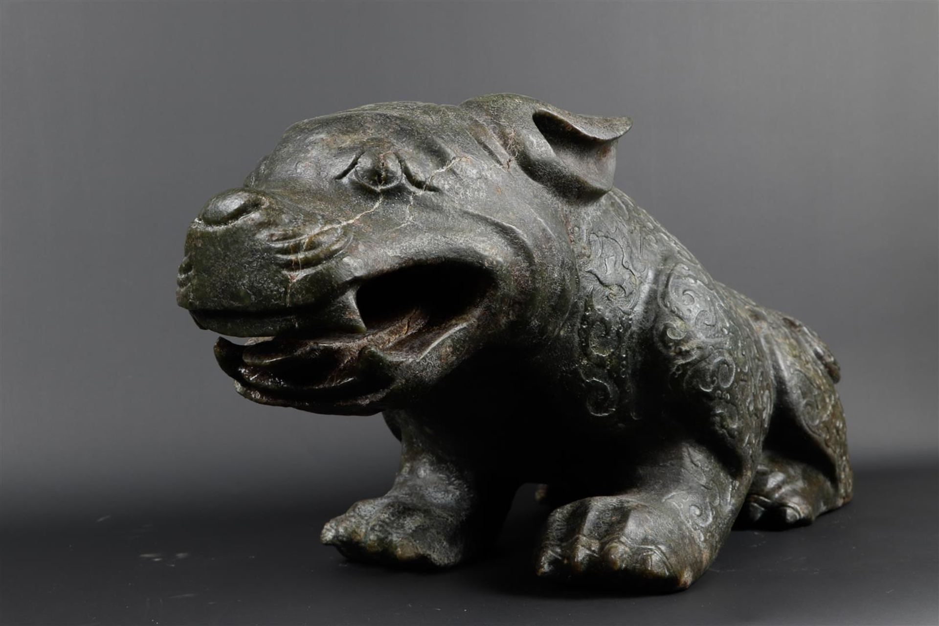 A "Spinach" jade sculpture of a fantasy lion. 20th century. Weight 34.5 kg. - Image 10 of 14