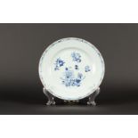 A porcelain plate with blossom branch decor. China, Qianglong.