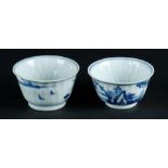 Two porcelain bowls with relief decoration with river landscapes on the outside, 1x marked with seal