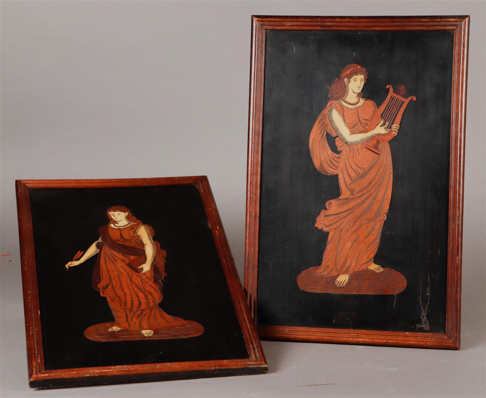 A set of two marquetry representations of allegorical figures for literature and music.