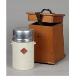 A vintage "Ikara" thermos in wooden case.