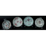 Four porcelain plates Famille Rose and milk-and-blood, all with rich floral decoration, 1x with bird