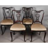 A lot consisting of four chairs with open backs. 19th century.