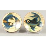 A set of polychrome pottery plates with fish decor, Puigdemont Studio Art Pottery.
