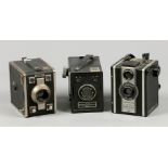 One consisting of (3) box cameras including a Vredebox Dandard Menis 49, a Coronet D-20 box camera,