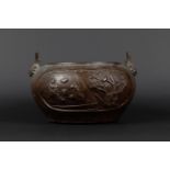 A bronze handle pot decorated with various Chinese figures. China, 19th century.