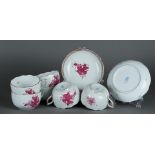 A set of 5 + 6 porcelain tea cups and saucers with apponyi purple decor. Herend, Hungary.