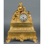 An ormolu bronze French mantel clock with a poet. Approx. 1860.