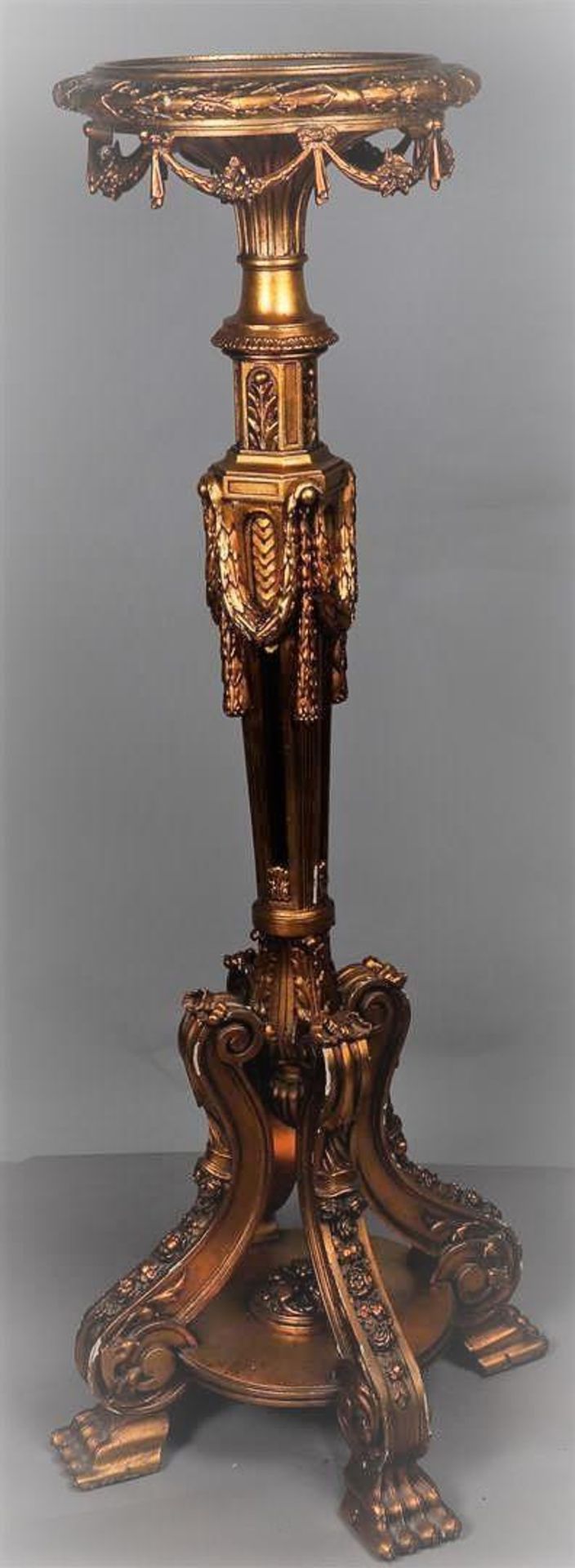 A richly decorated, bronzed wooden pedestal after an older example, 20th century.