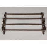 A richly carved two-shelf plate rack, 19th century.